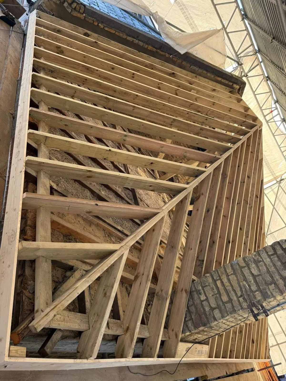 New roof timbers and rafters during a re-roof in Crediton