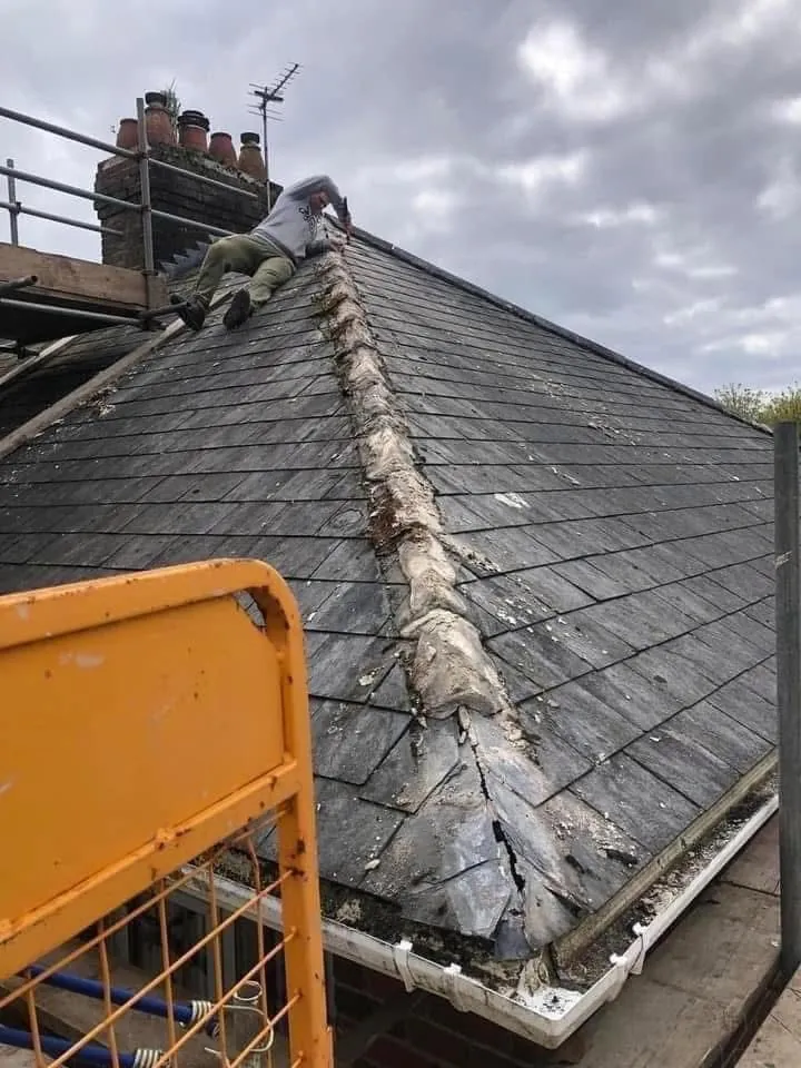 Slate roof ridge and chimney repair in Crediton